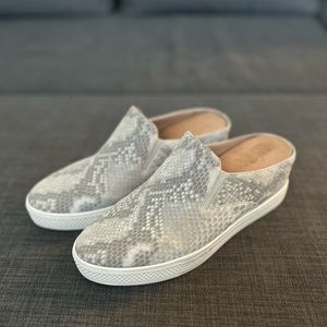 Lightly worn open heeled wedge dress tennies